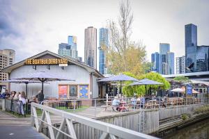 Boaties on west side of building