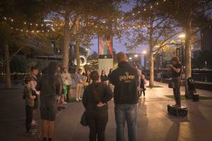 Busking at dusk Crown Promenade